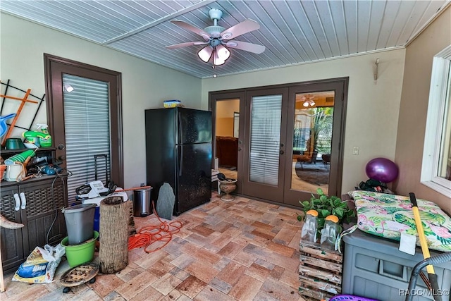 interior space featuring ceiling fan