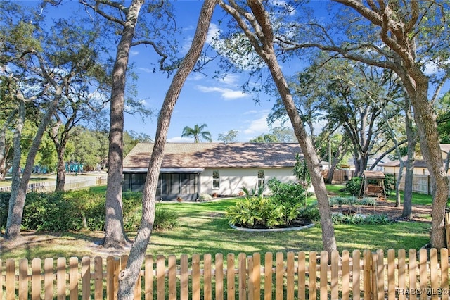 exterior space with a front yard