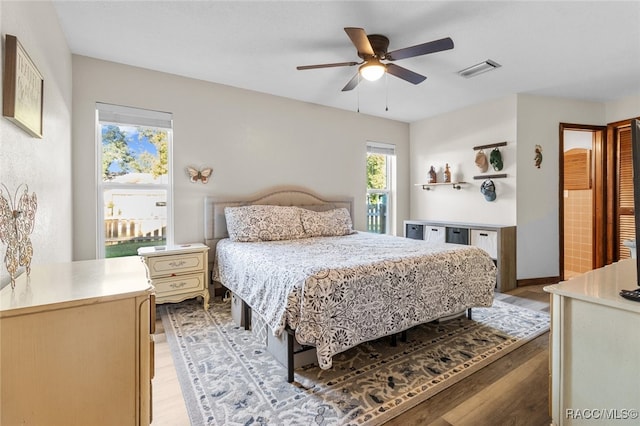 bedroom featuring ceiling fan and light wood-type flooring