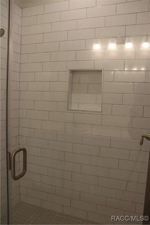 bathroom featuring a stall shower