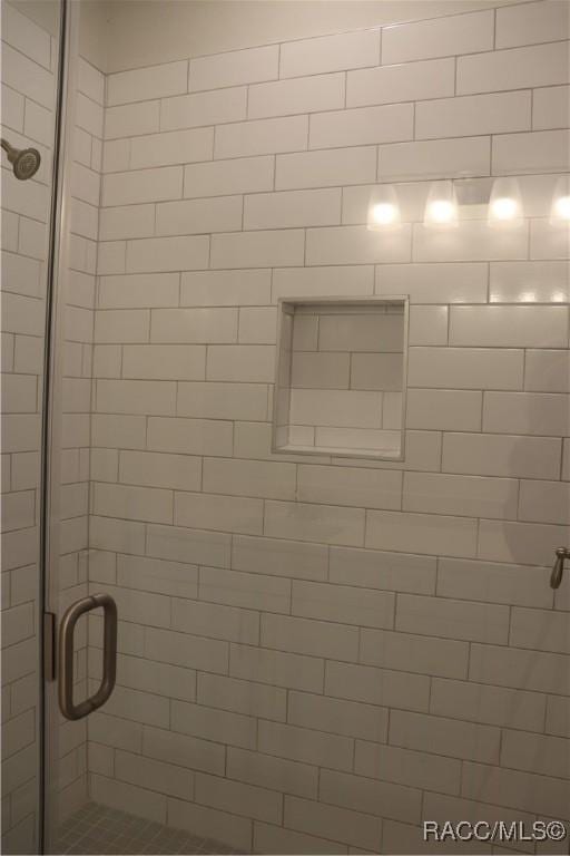 interior details with a shower stall