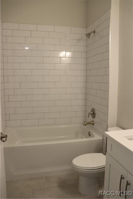 full bath featuring washtub / shower combination, vanity, and toilet