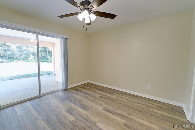 unfurnished room with ceiling fan and light hardwood / wood-style flooring