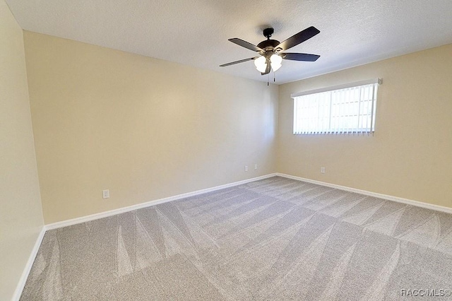 unfurnished room with carpet floors, a textured ceiling, and ceiling fan