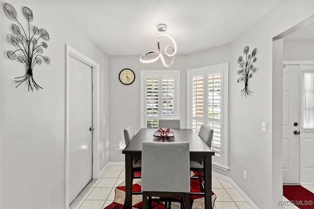 1631 N Dalary Pt, Crystal River, FL 34429 - dining room featuring light tile patterned flooring and baseboards