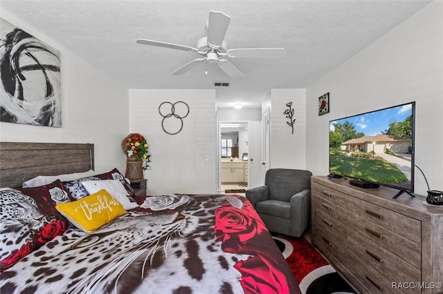 1631 N Dalary Pt, Crystal River, FL 34429 - bedroom with connected bathroom and ceiling fan