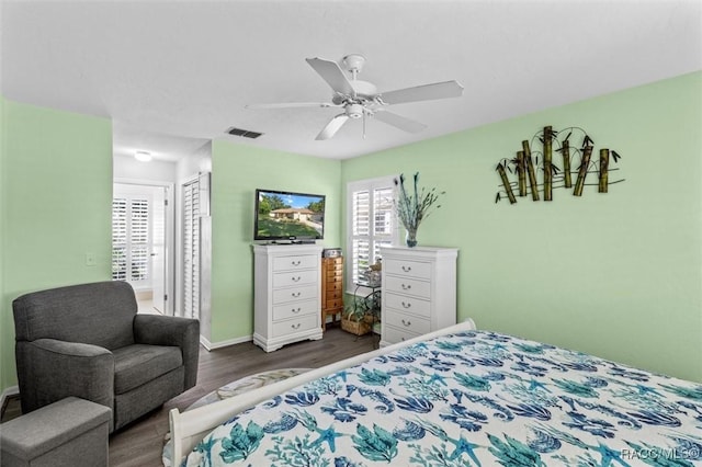 1631 N Dalary Pt, Crystal River, FL 34429 - bedroom featuring wood finished floors, a closet, baseboards, and ceiling fan