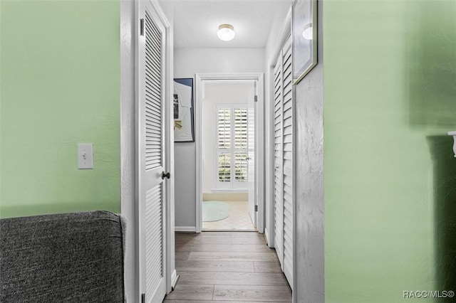 1631 N Dalary Pt, Crystal River, FL 34429 - hallway featuring wood-type flooring and baseboards
