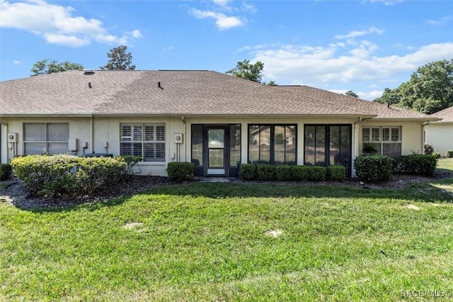 1631 N Dalary Pt, Crystal River, FL 34429 - view of front of house with stucco siding and a front lawn