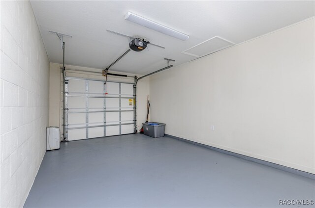 garage featuring a garage door opener