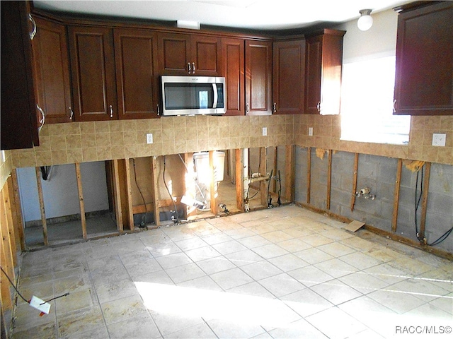 kitchen featuring backsplash