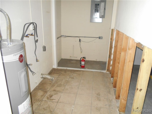 interior space featuring electric panel and water heater