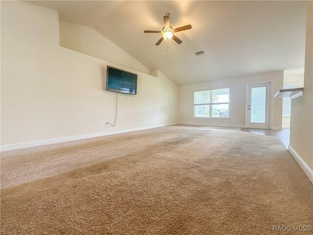 dining space with an inviting chandelier and light carpet