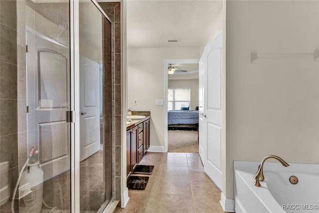 bathroom with vanity, tile patterned floors, independent shower and bath, and ceiling fan