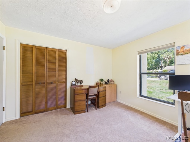 896 N Hollywood Cir, Crystal River, FL 34429 - carpeted home office with baseboards and a textured ceiling