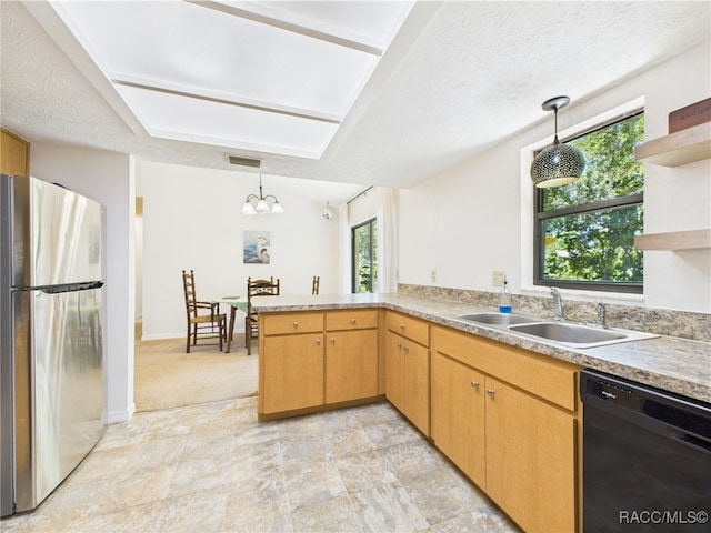 896 N Hollywood Cir, Crystal River, FL 34429 - kitchen featuring black dishwasher, freestanding refrigerator, a sink, open shelves, and a peninsula
