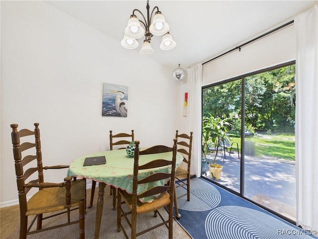 896 N Hollywood Cir, Crystal River, FL 34429 - dining area with carpet, a chandelier, and baseboards