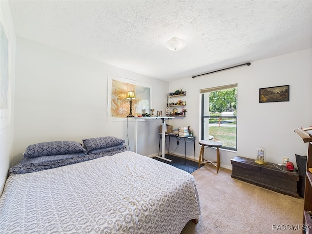 896 N Hollywood Cir, Crystal River, FL 34429 - bedroom with carpet, a textured ceiling, and baseboards