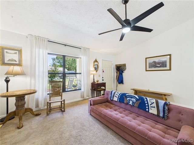 896 N Hollywood Cir, Crystal River, FL 34429 - carpeted living area featuring lofted ceiling, ceiling fan, a textured ceiling, and baseboards