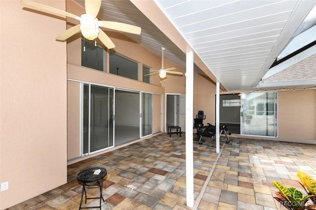 view of patio with ceiling fan