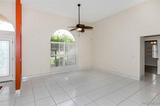 interior space featuring ceiling fan and light tile patterned floors