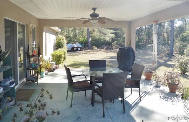 view of patio featuring ceiling fan and area for grilling