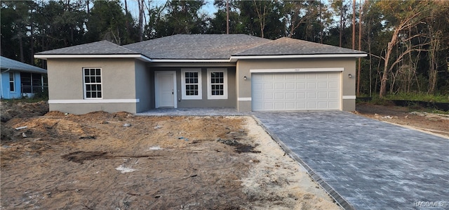 view of front of house with a garage