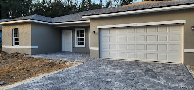 view of front of home featuring a garage