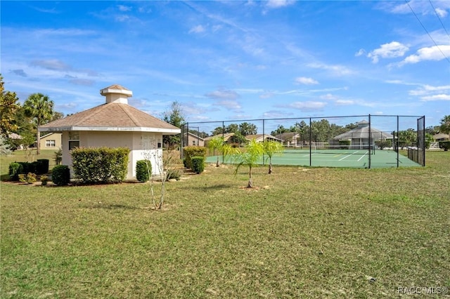 view of yard with tennis court