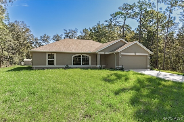 single story home with a front yard and a garage