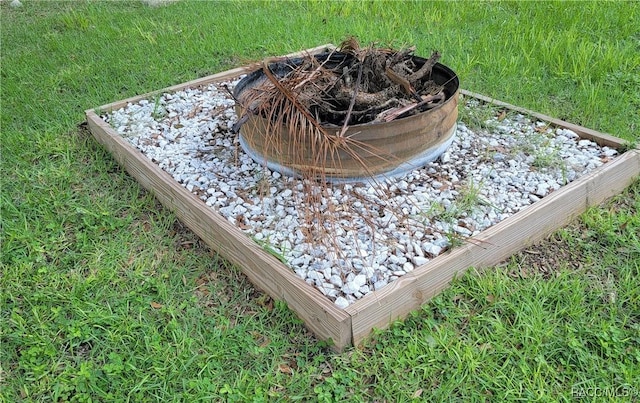 20165 SE 115th Ave, Inglis, FL 34449 - exterior view of a fire pit