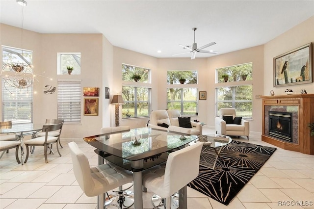 3915 N Grayhawk Loop, Lecanto, FL 34461 - dining room featuring light tile patterned flooring, a high end fireplace, ceiling fan, and recessed lighting
