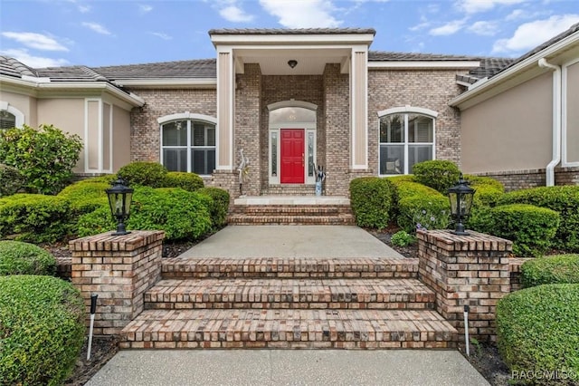 3915 N Grayhawk Loop, Lecanto, FL 34461 - property entrance featuring brick siding