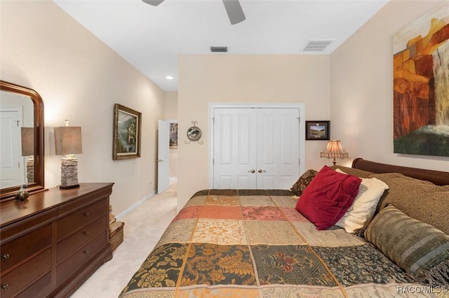 3915 N Grayhawk Loop, Lecanto, FL 34461 - bedroom featuring light carpet, ceiling fan, and a closet