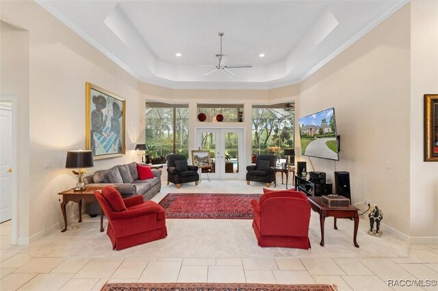 3915 N Grayhawk Loop, Lecanto, FL 34461 - living room with a ceiling fan, a raised ceiling, french doors, light tile patterned flooring, and recessed lighting