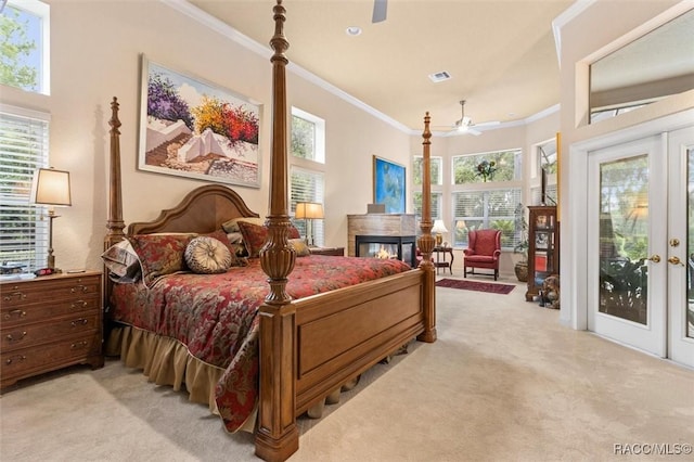 3915 N Grayhawk Loop, Lecanto, FL 34461 - bedroom with light colored carpet, access to outside, ornamental molding, and french doors
