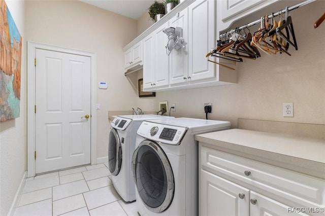 3915 N Grayhawk Loop, Lecanto, FL 34461 - laundry room with cabinet space, washing machine and dryer, and light tile patterned floors