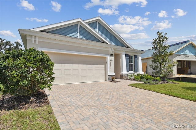 view of front of property featuring a garage