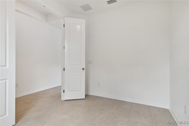 view of tiled spare room