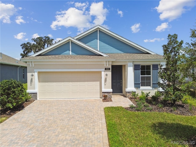 view of front of property featuring a garage