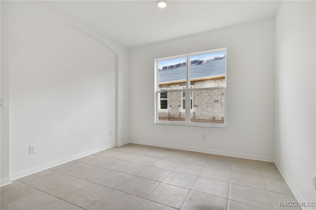 view of tiled spare room