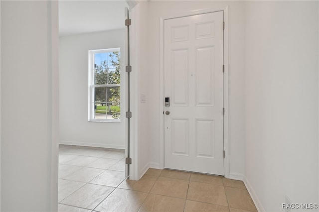 entryway featuring light tile patterned flooring