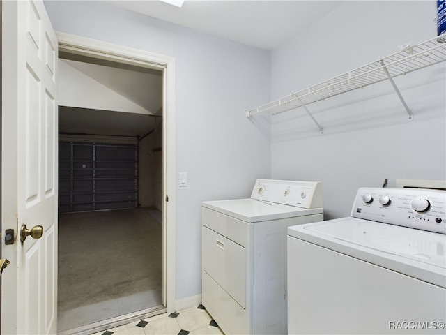 laundry room with washing machine and dryer