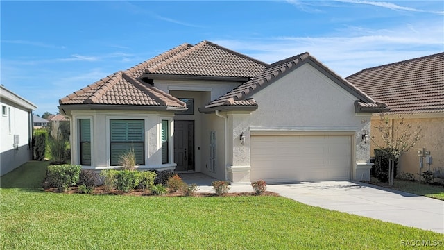 view of front facade featuring a garage and a front yard