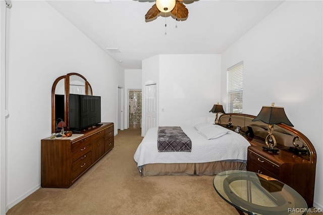 carpeted bedroom featuring ceiling fan