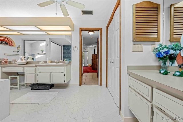 bathroom with vanity, tile patterned floors, and ceiling fan