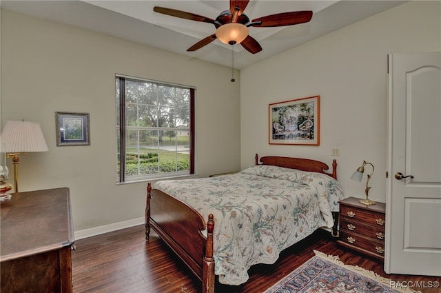 bedroom featuring ceiling fan and dark hardwood / wood-style flooring