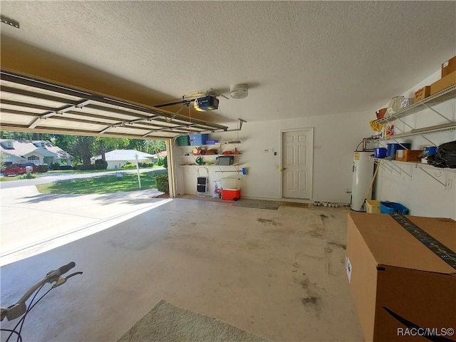 9120 SW 193rd Cir, Dunnellon, FL 34432 - garage featuring water heater and a garage door opener