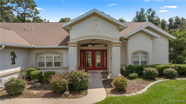 property entrance featuring french doors