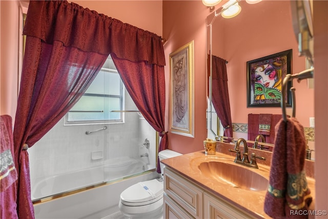 full bathroom featuring vanity, toilet, and enclosed tub / shower combo